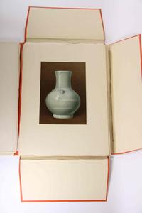 A Group of Four Ceramic Plates Height of tallest 22 1/2 inches.