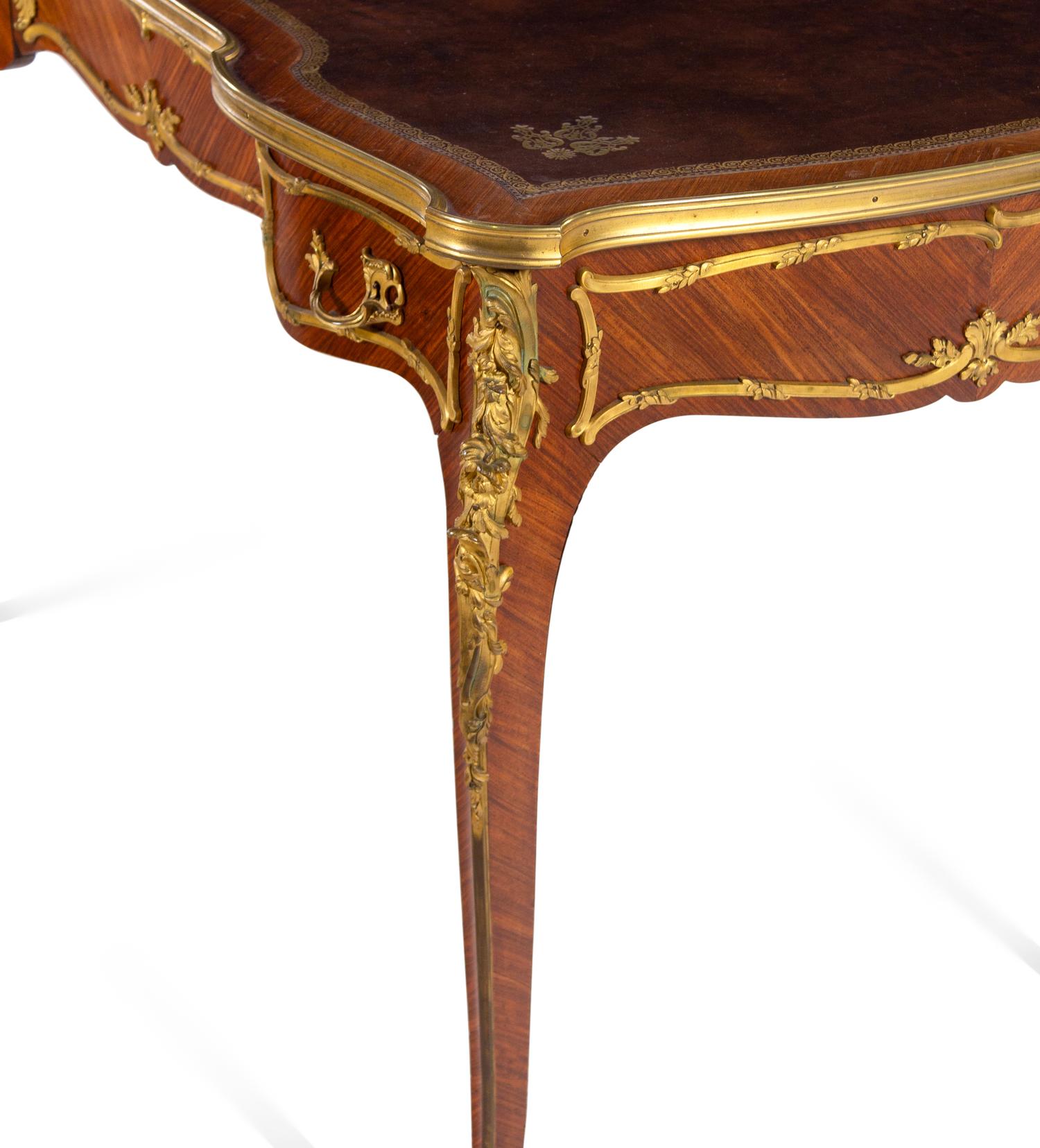 A Louis XV Style Gilt Bronze Mounted Kingwood Bureau Plat by François Linke