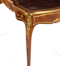 A Louis XV Style Gilt Bronze Mounted Kingwood Bureau Plat by François Linke