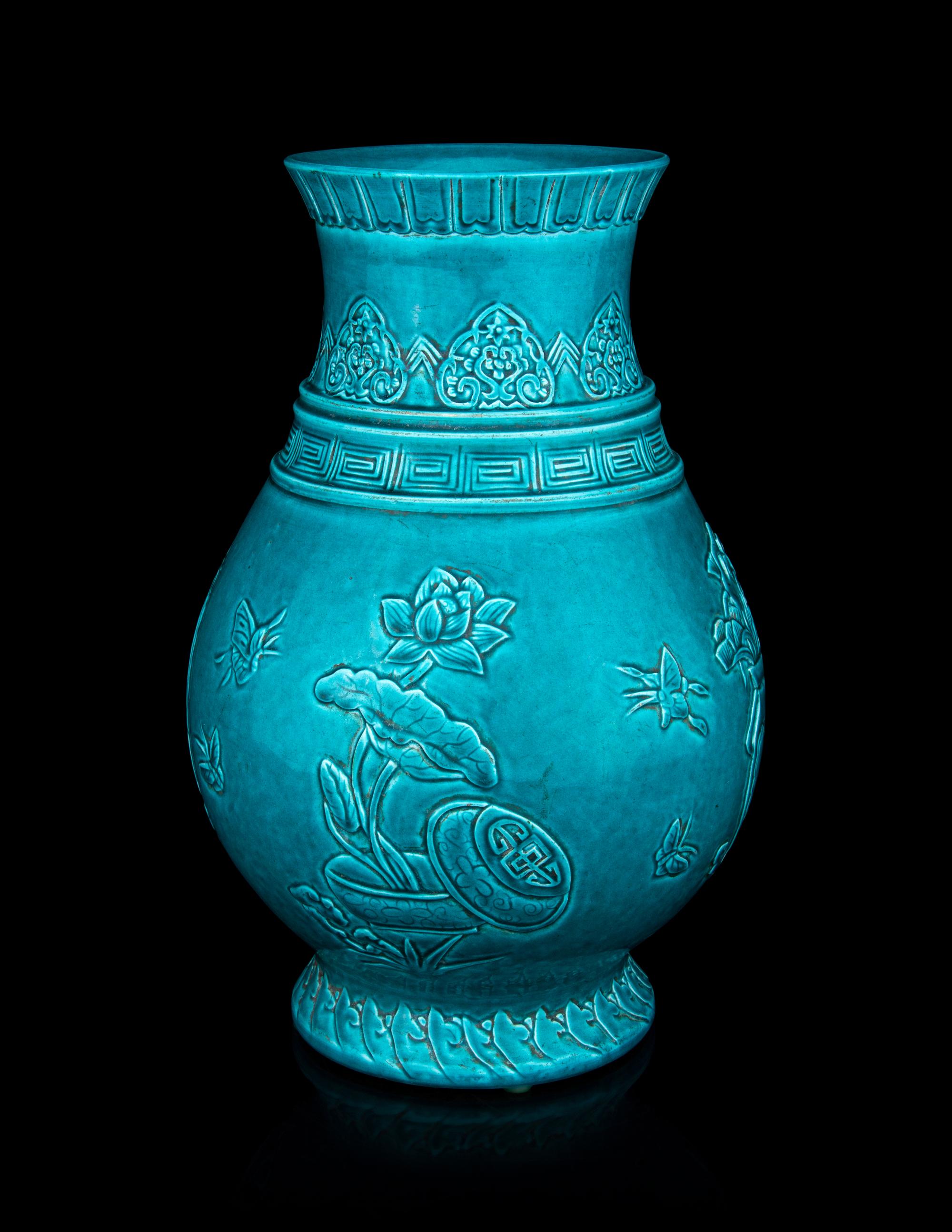A Carved Turquoise-Glazed Porcelain Hu Vase