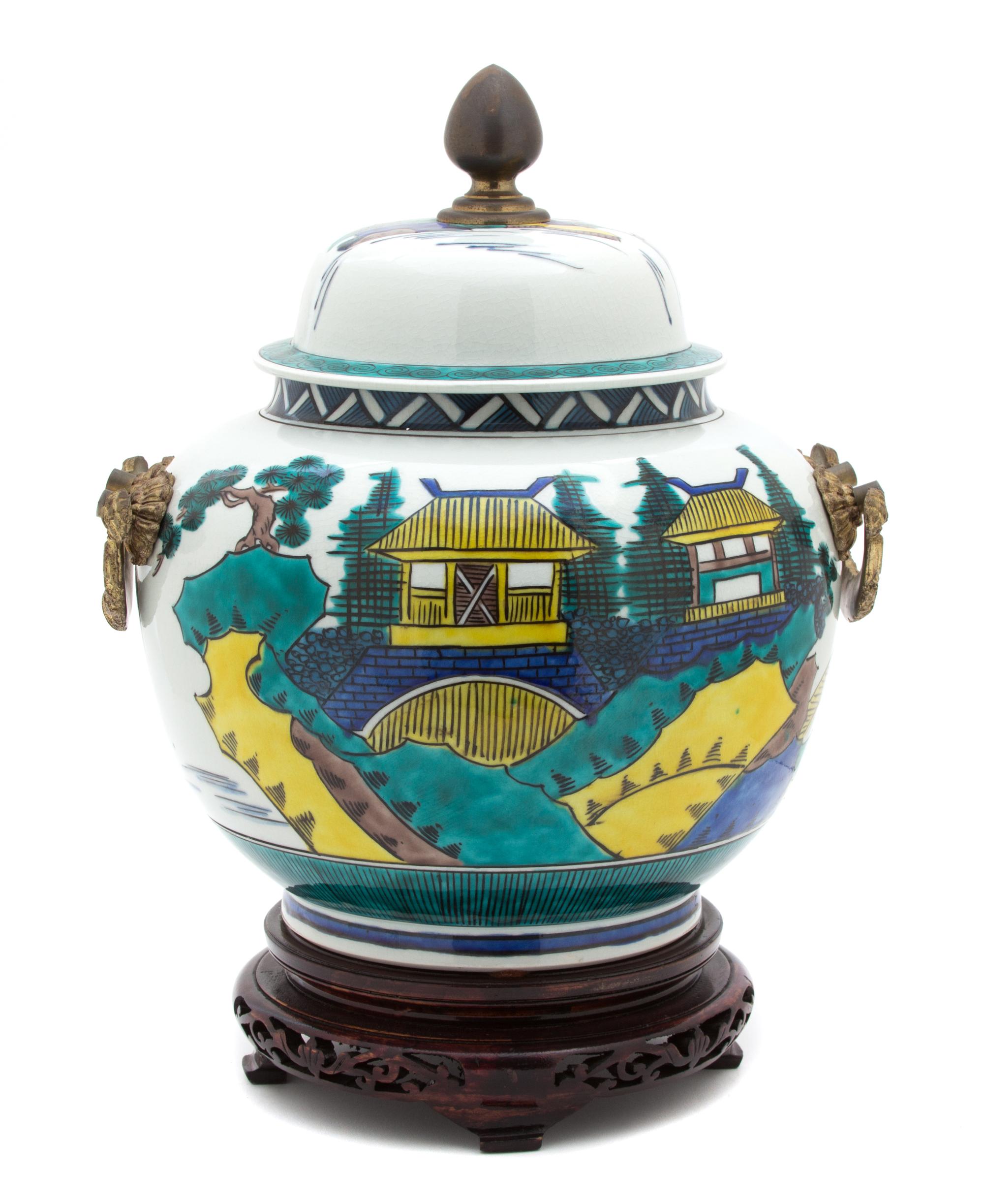 An Asian Polychromed Porcelain Covered Jar Height 14 x diameter 10 inches. — 20TH CENTURY