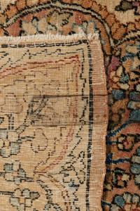 A Kirman Wool Rug