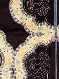 Two Black Ground Embroidered Silk Lady's Coats