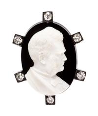 A Victorian Silver Topped Gold, Carved Sardonyx, and Diamond Pendant/Brooch, 17.50 dwts.