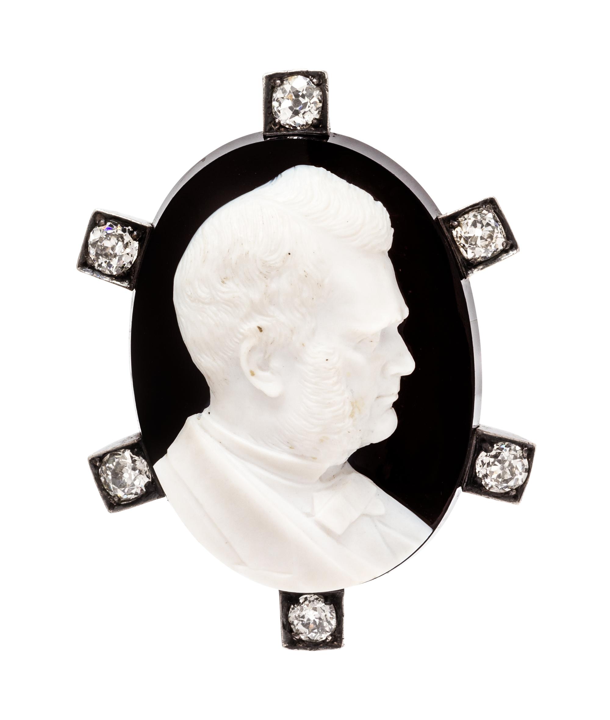 A Victorian Silver Topped Gold, Carved Sardonyx, and Diamond Pendant/Brooch, 17.50 dwts.
