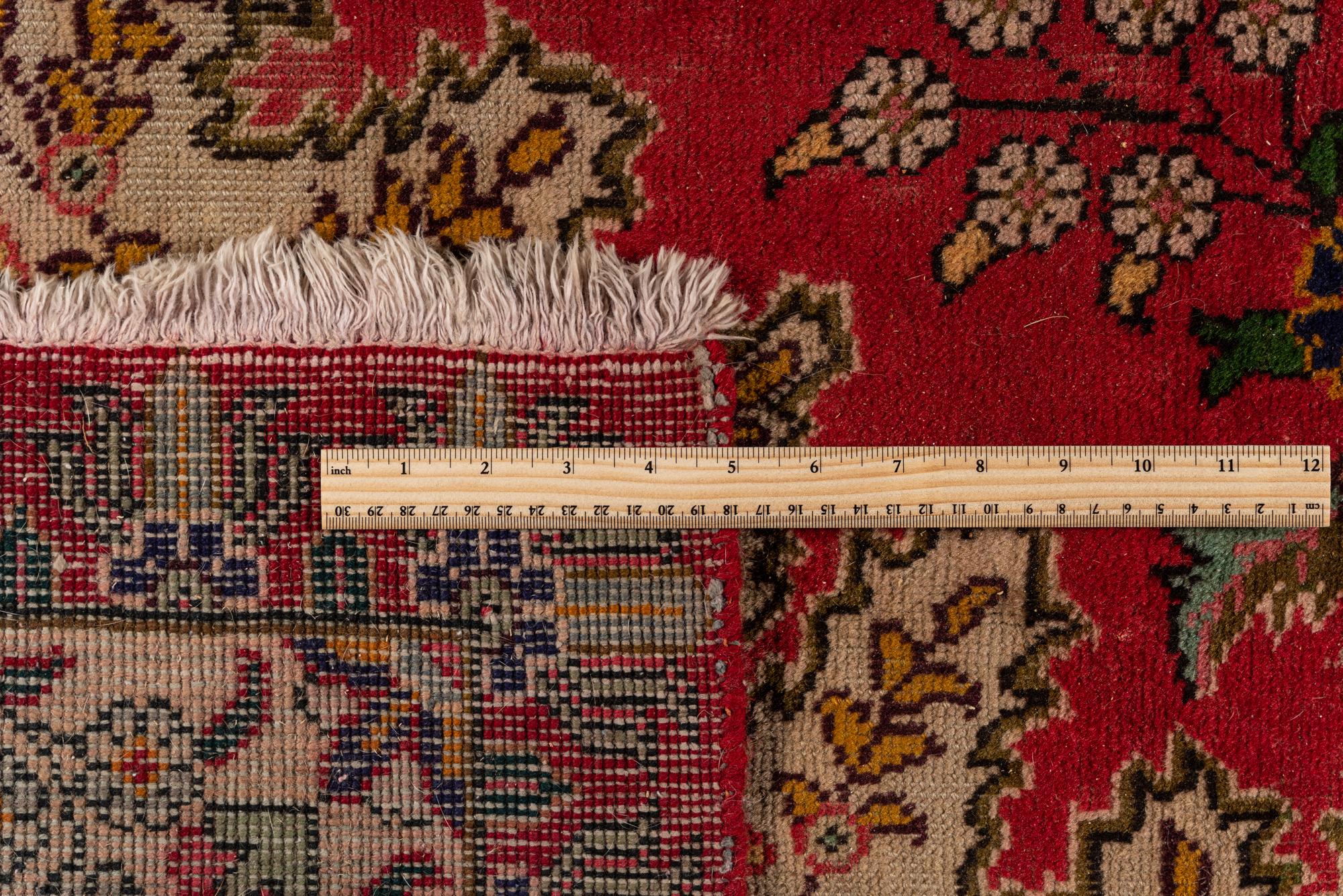 A Tabriz Wool Rug