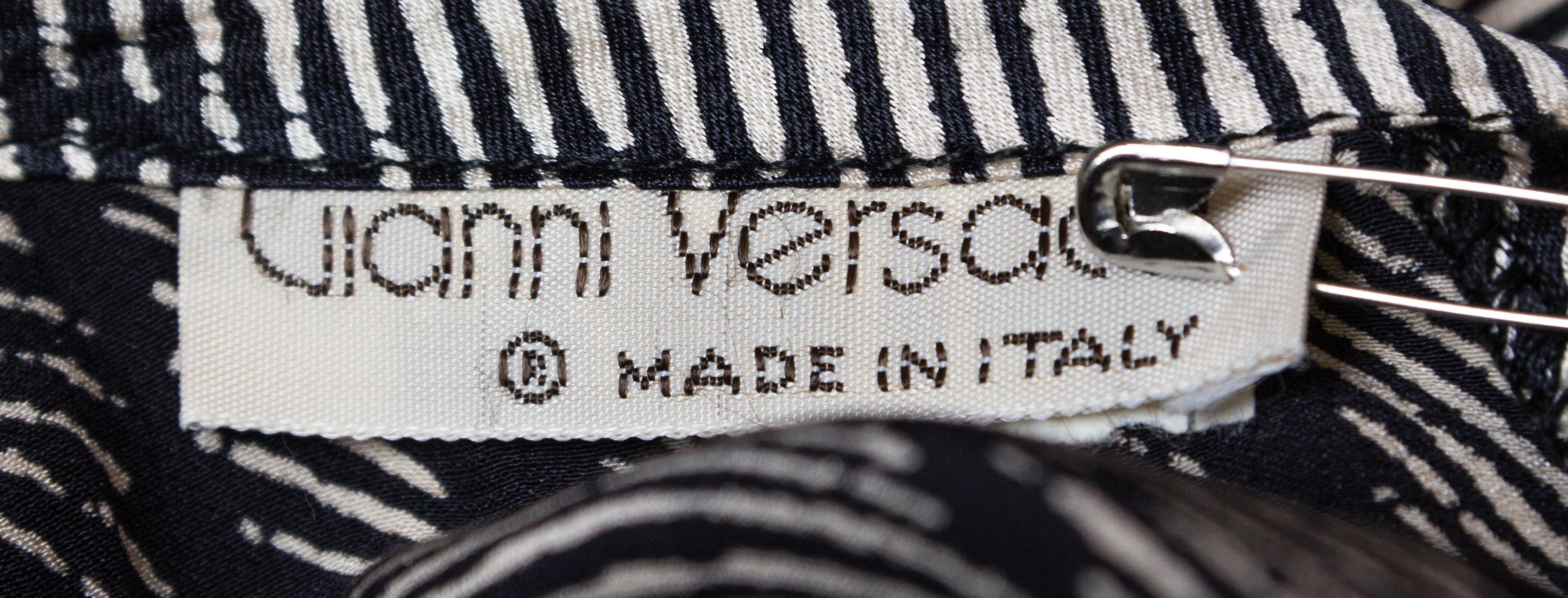 A Gianni Versace Black and Cream Silk Jumpsuit,