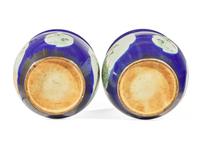 A pair of large Chinese Famille Rose-decorated cobalt-ground jardinières, late Qing to Republic period
