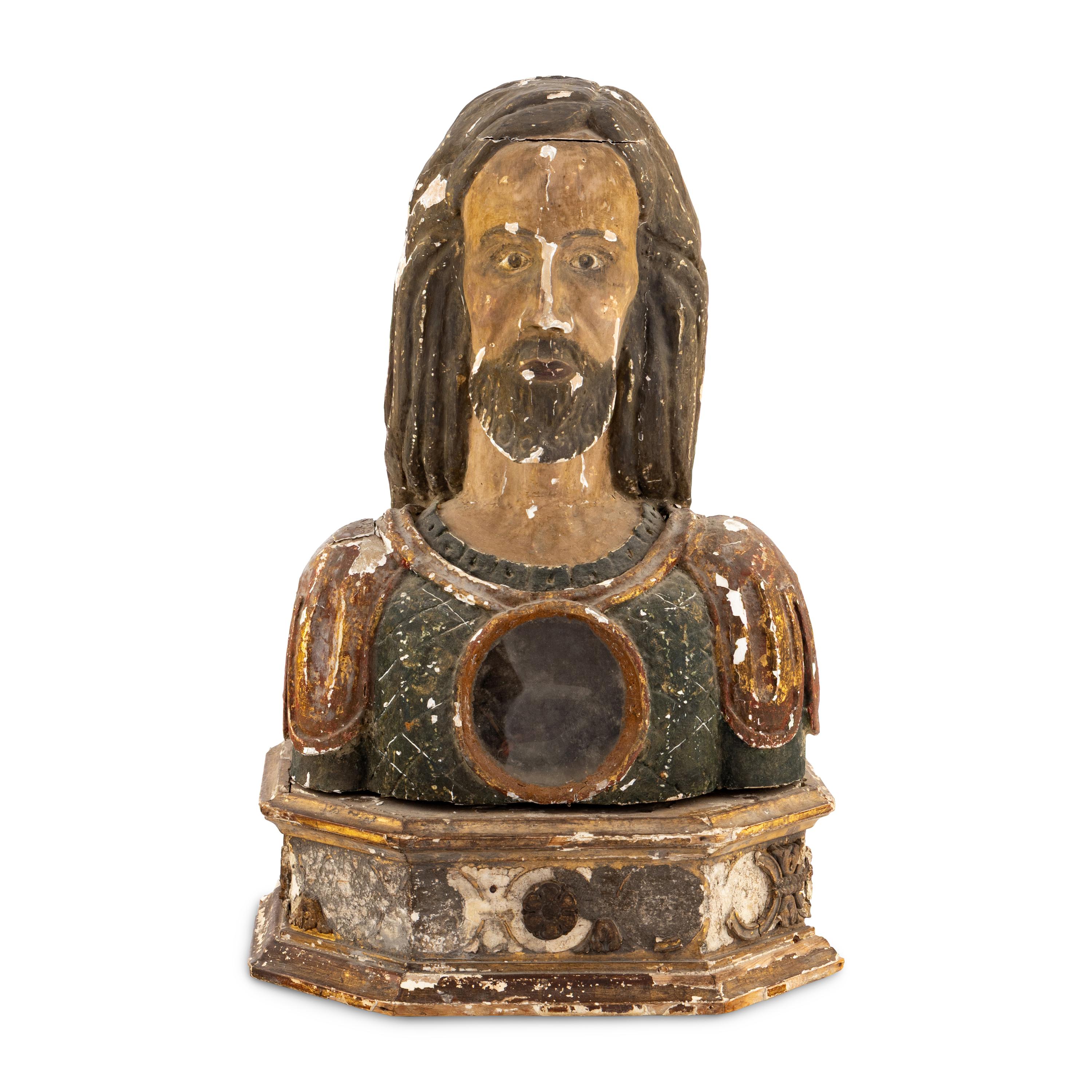 A Spanish Carved Wood and Polychrome Decorated Reliquary Bust