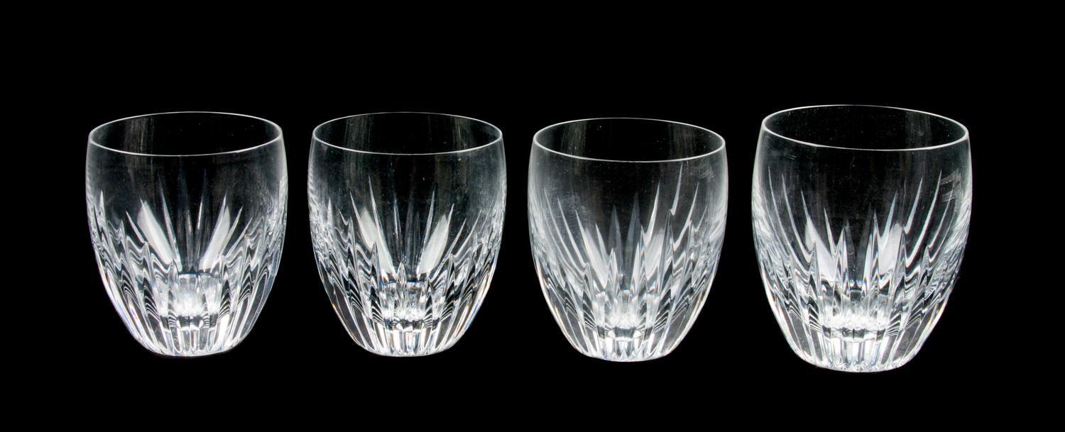 A Set of Four Baccarat Cut Glass Tumblers Height 3 5/8 inches.
