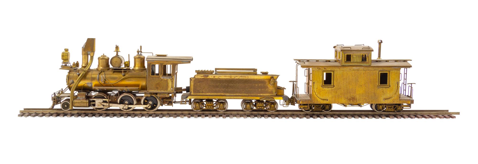 A United Scale Models Brass N-Gauge 2-6-0 Locomotive, Tender and Caboose