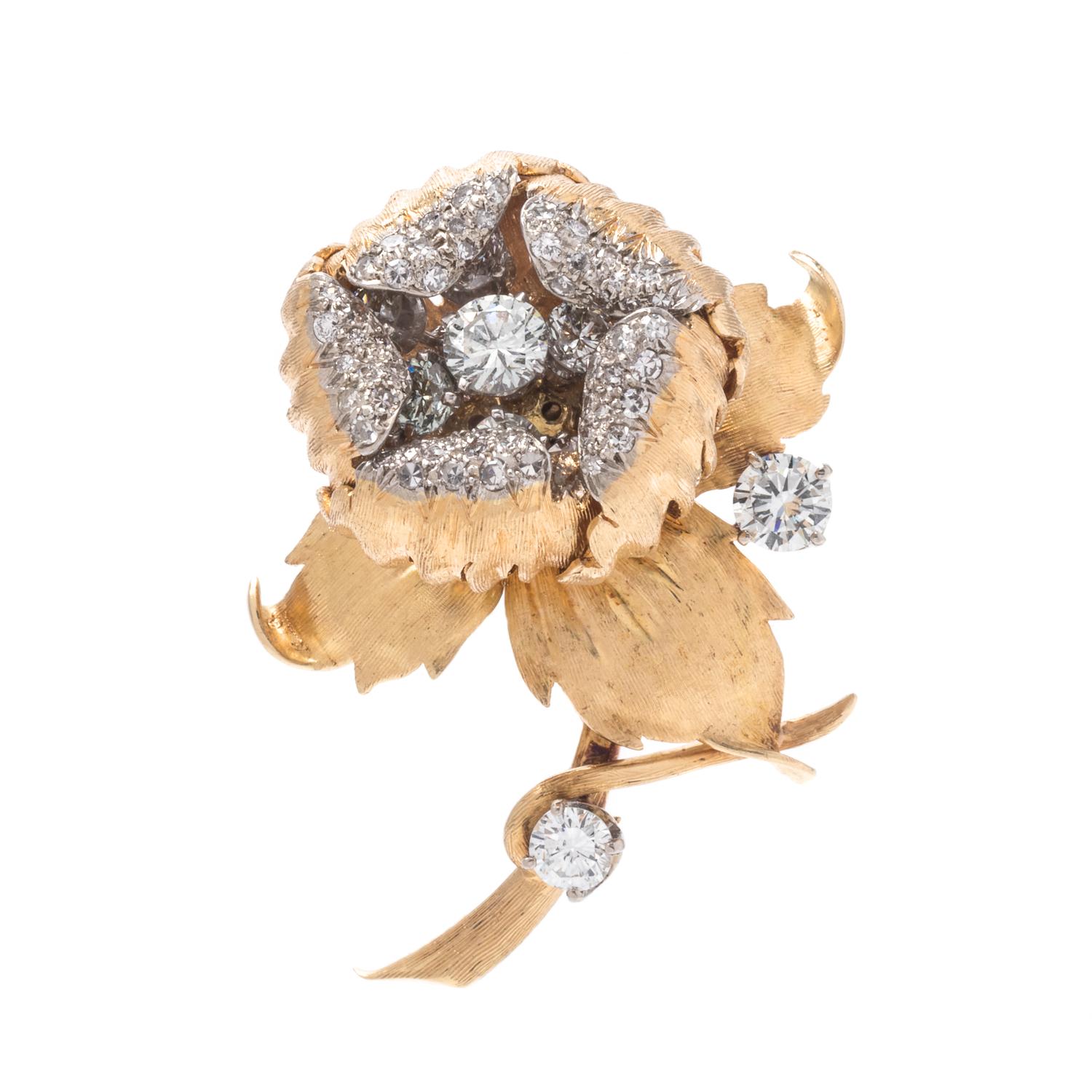 A Bicolored Gold and Diamond En Tremblant Flower Brooch,