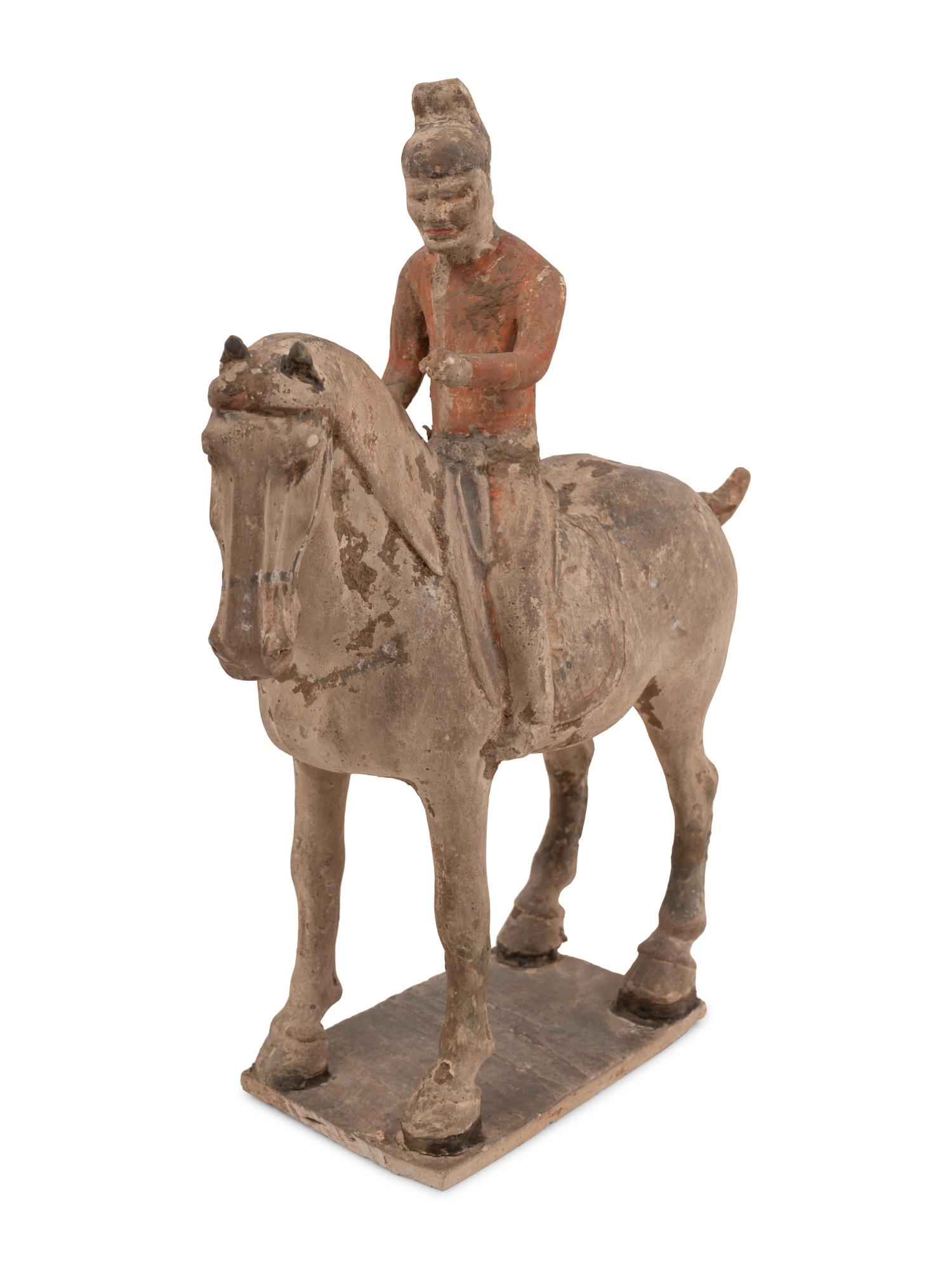 A Pair of Chinese Glazed Terra Cotta Horses with Riders and Three Glazed Terra Cotta Figures