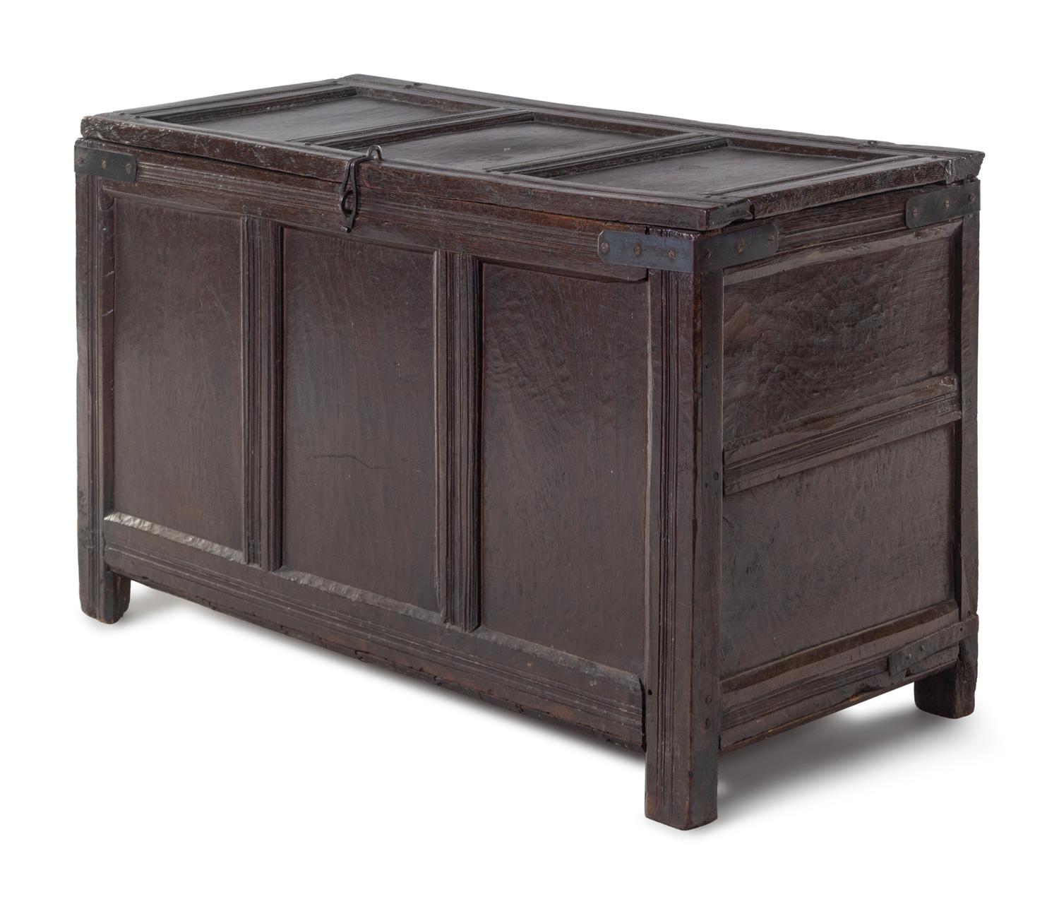 A Jacobean Iron Mounted Molded and Paneled Oak Storage Chest