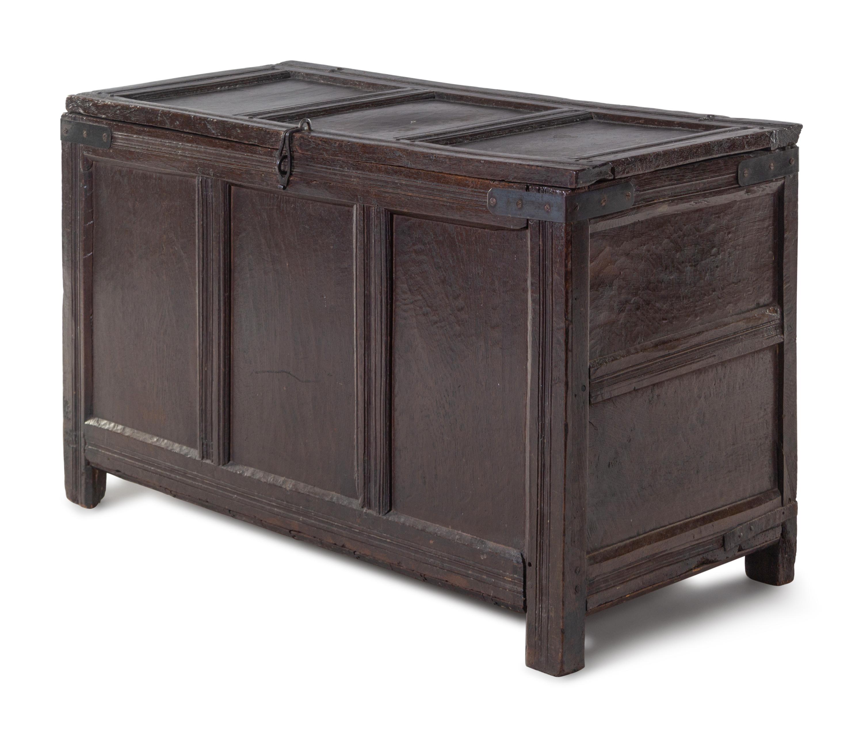 A Jacobean Iron Mounted Molded and Paneled Oak Storage Chest