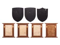 A Group of Three Shields and Four Armorial Panels