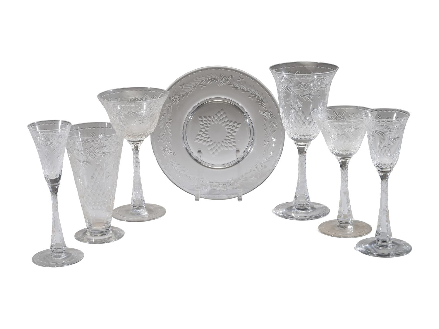 A Collection of Cut Glass Stemware and Plates