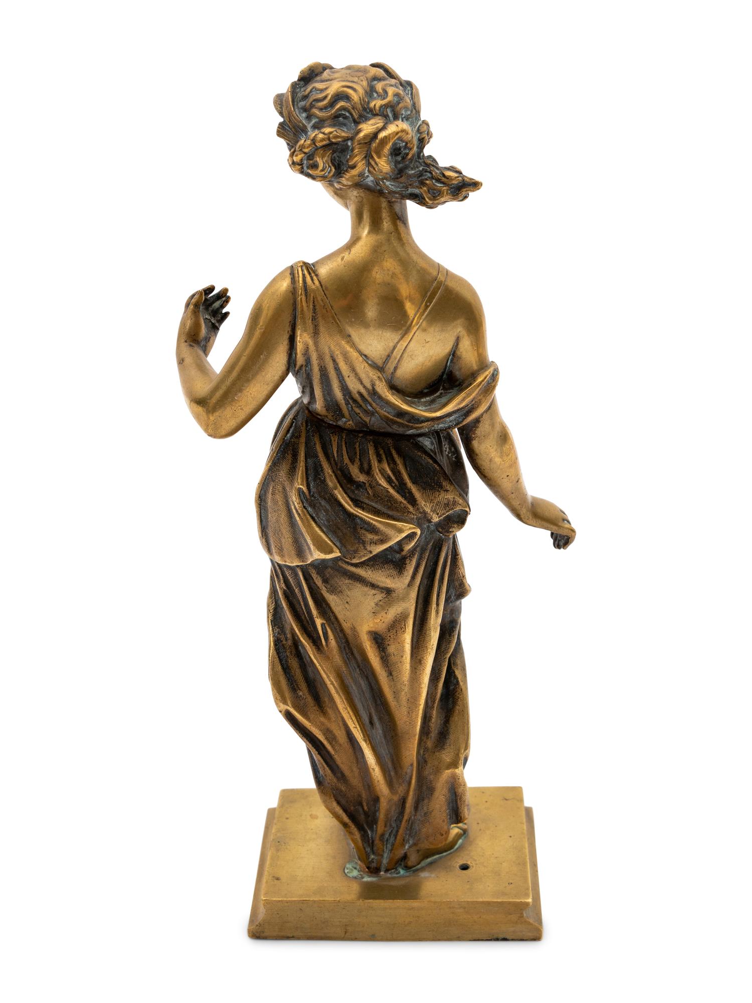 A Gilt Bronze Figure of a Muse