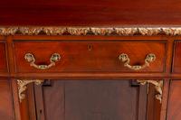A George III Style Parcel-Gilt Mahogany Kneehole Desk — LATE 19TH/EARLY 20TH CENTURY