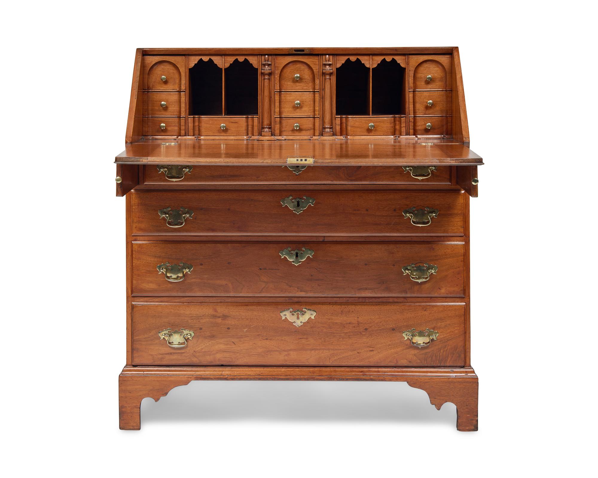 A Chippendale Walnut Slant-Front Desk