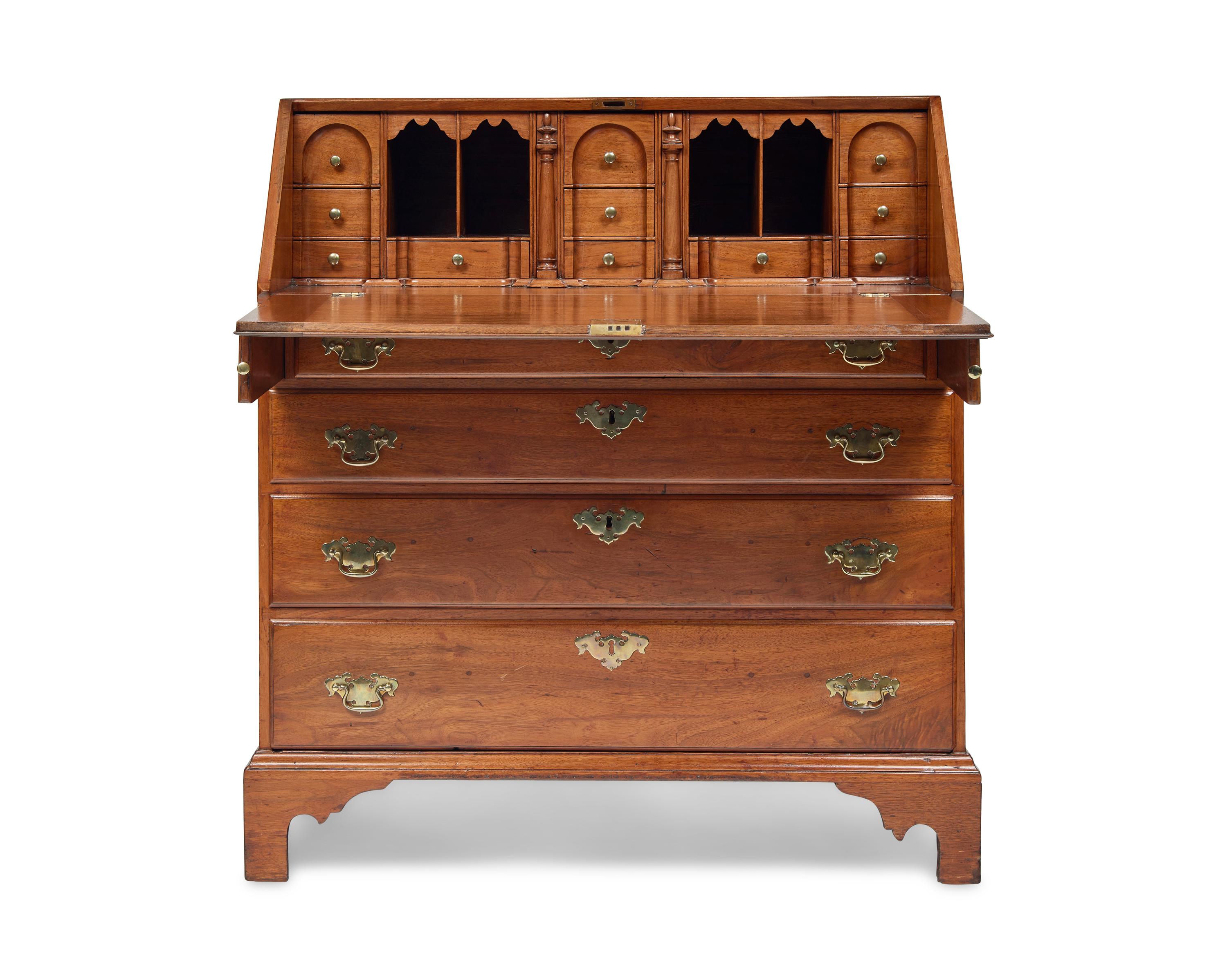 A Chippendale Walnut Slant-Front Desk