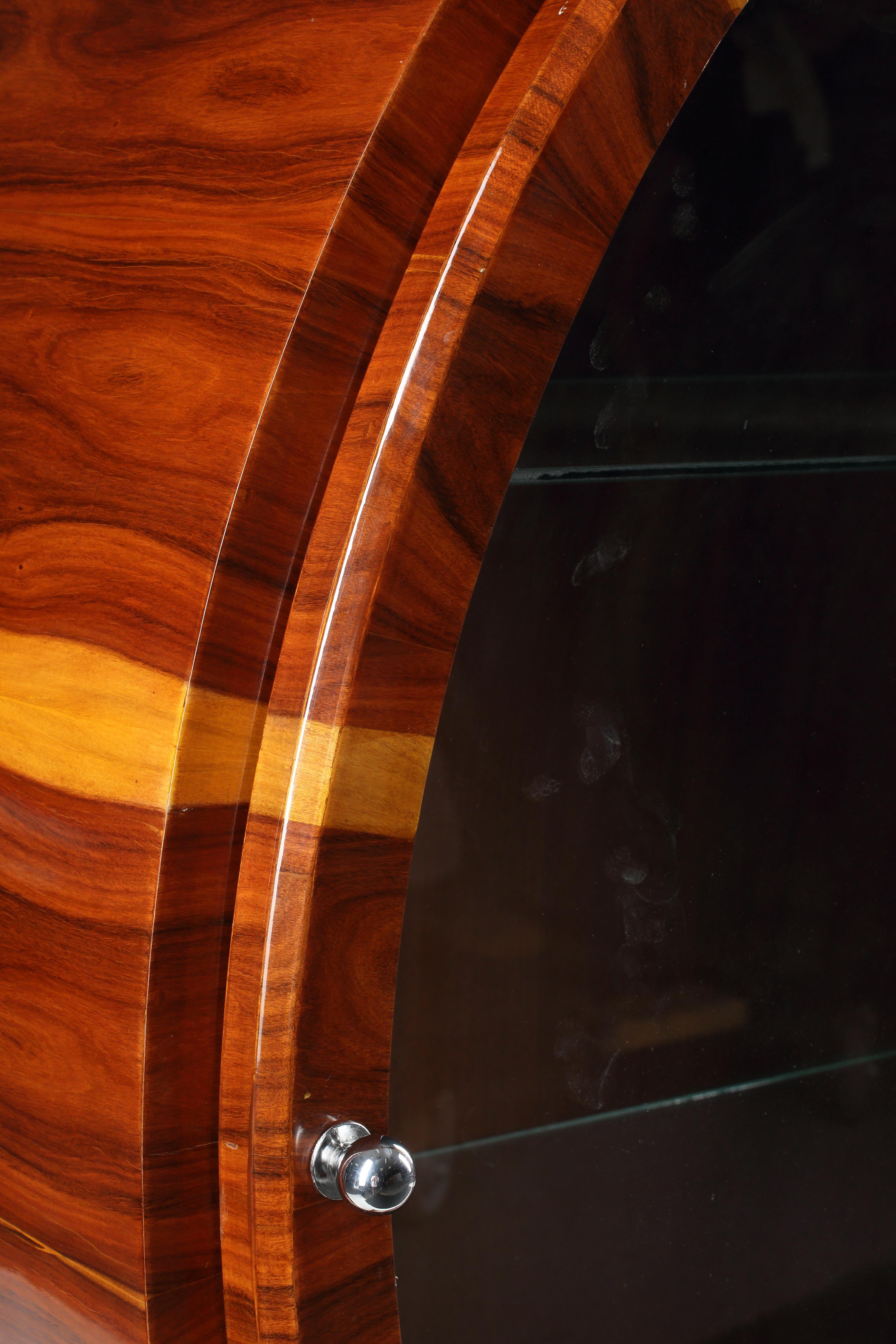A Continental Various Woods Veneered Circular Vitrine Cabinet