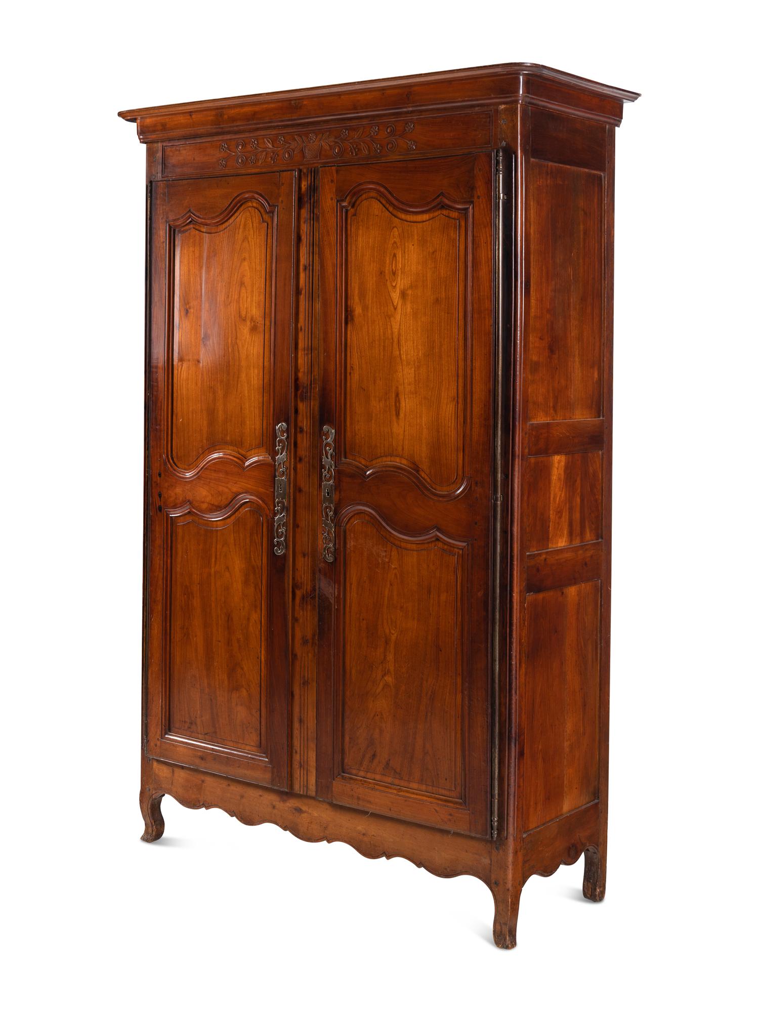 A Louis XV Provincial Walnut Armoire
