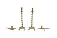 A Pair of Brass Candlesticks and a Pair of Chambersticks