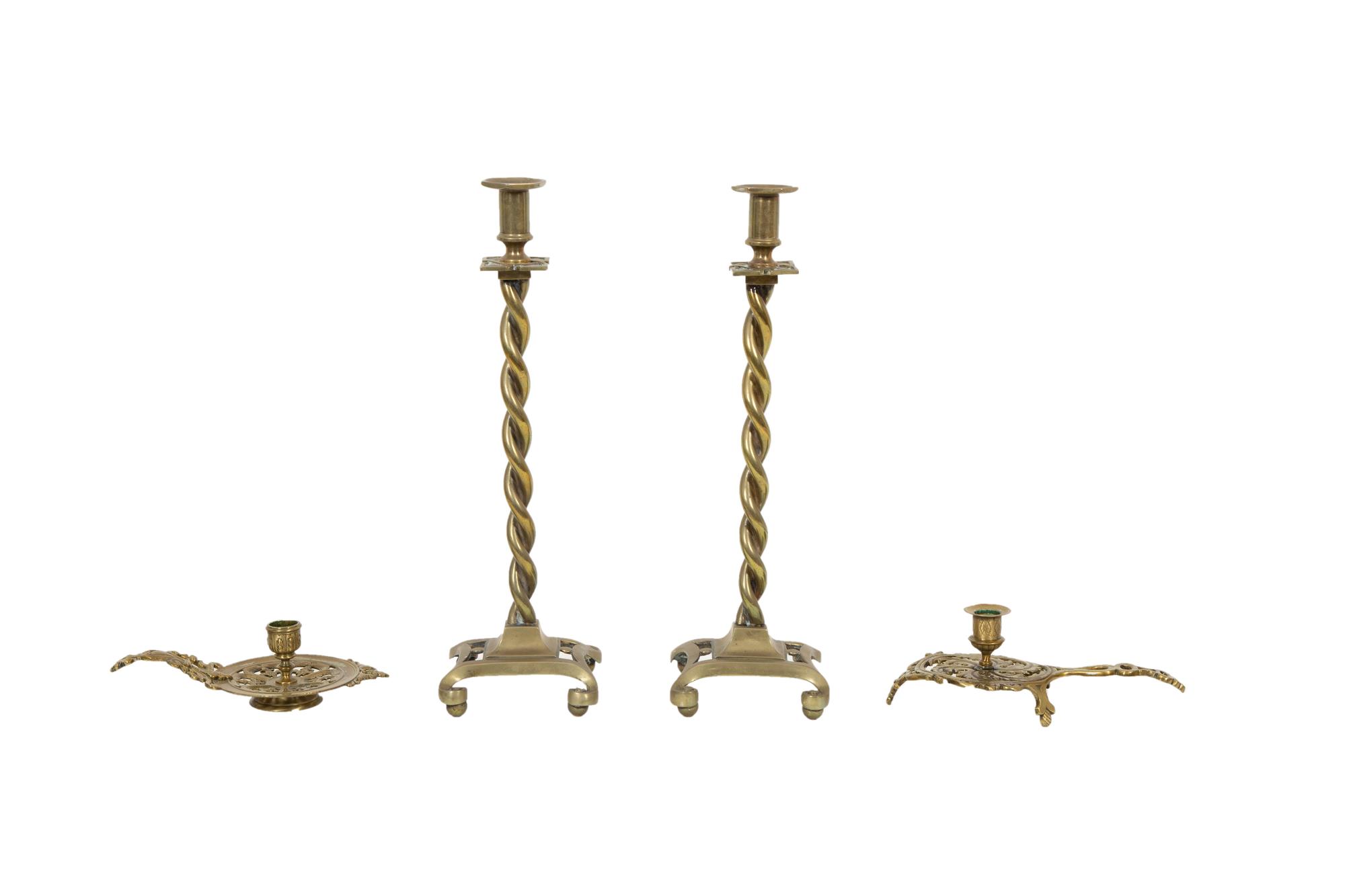 A Pair of Brass Candlesticks and a Pair of Chambersticks