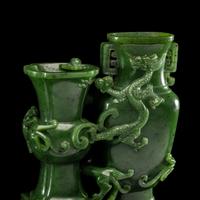 A Chinese Spinach Green Jade 'Dragon' Double Vase, Qianlong Mark 乾隆年制款碧玉雙聯瓶