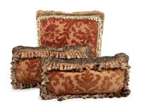 A Set of Three Velvet Upholstered Pillows with Tassels