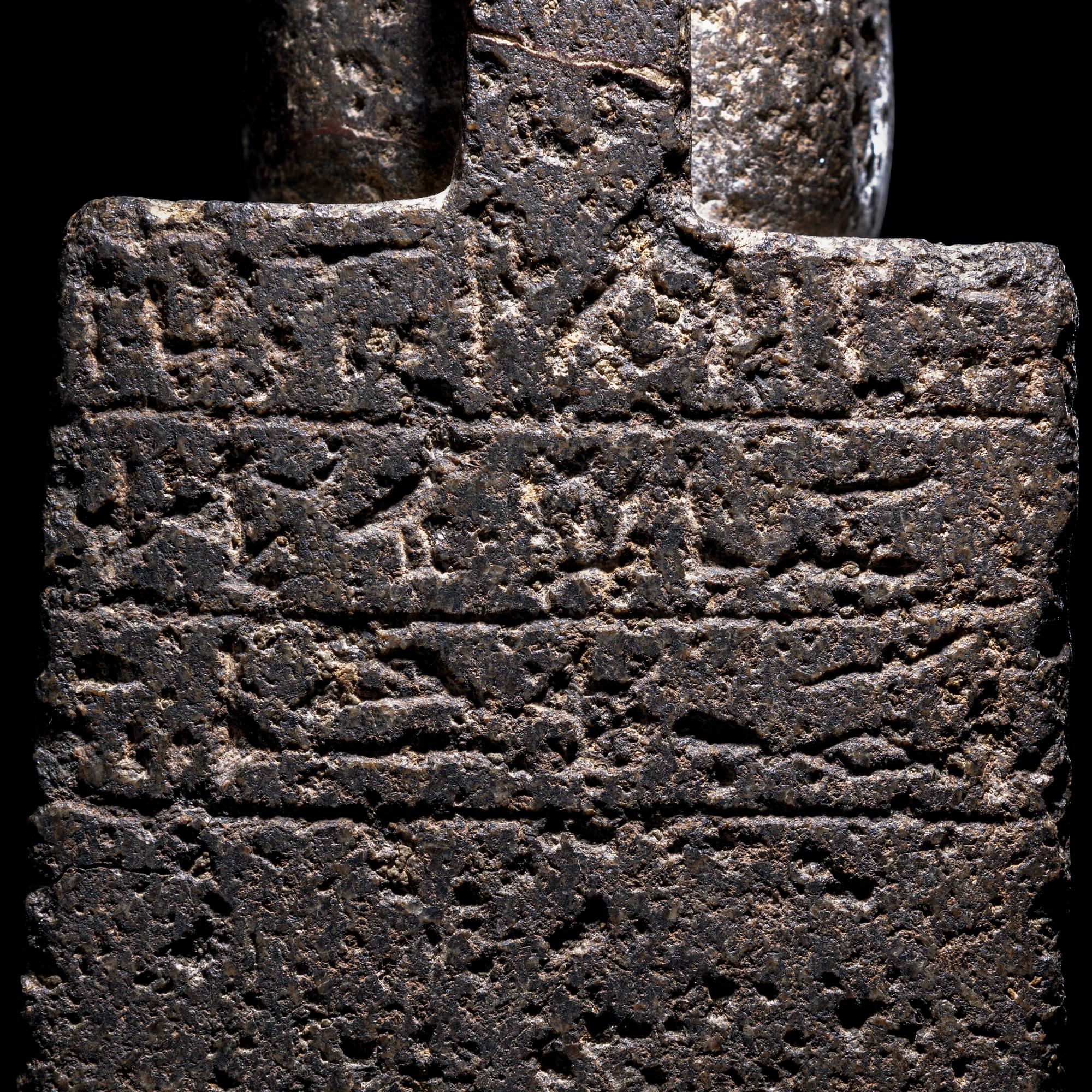 An Egyptian Diorite Seated Figure