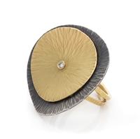 An Oxidized Silver, 18 Karat Yellow Gold and Diamond Ring, 8.95 dwts.