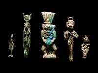 Four Egyptian Bronze Figures and One Egyptian Faience Bes
