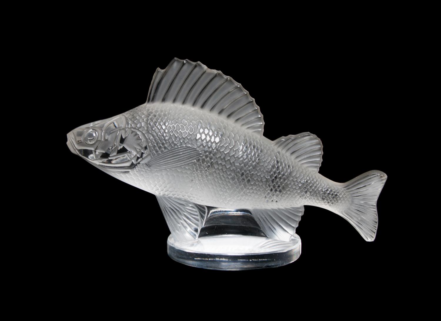 A Lalique Molded and Frosted Glass Paperweight Width 6 1/4 inches.