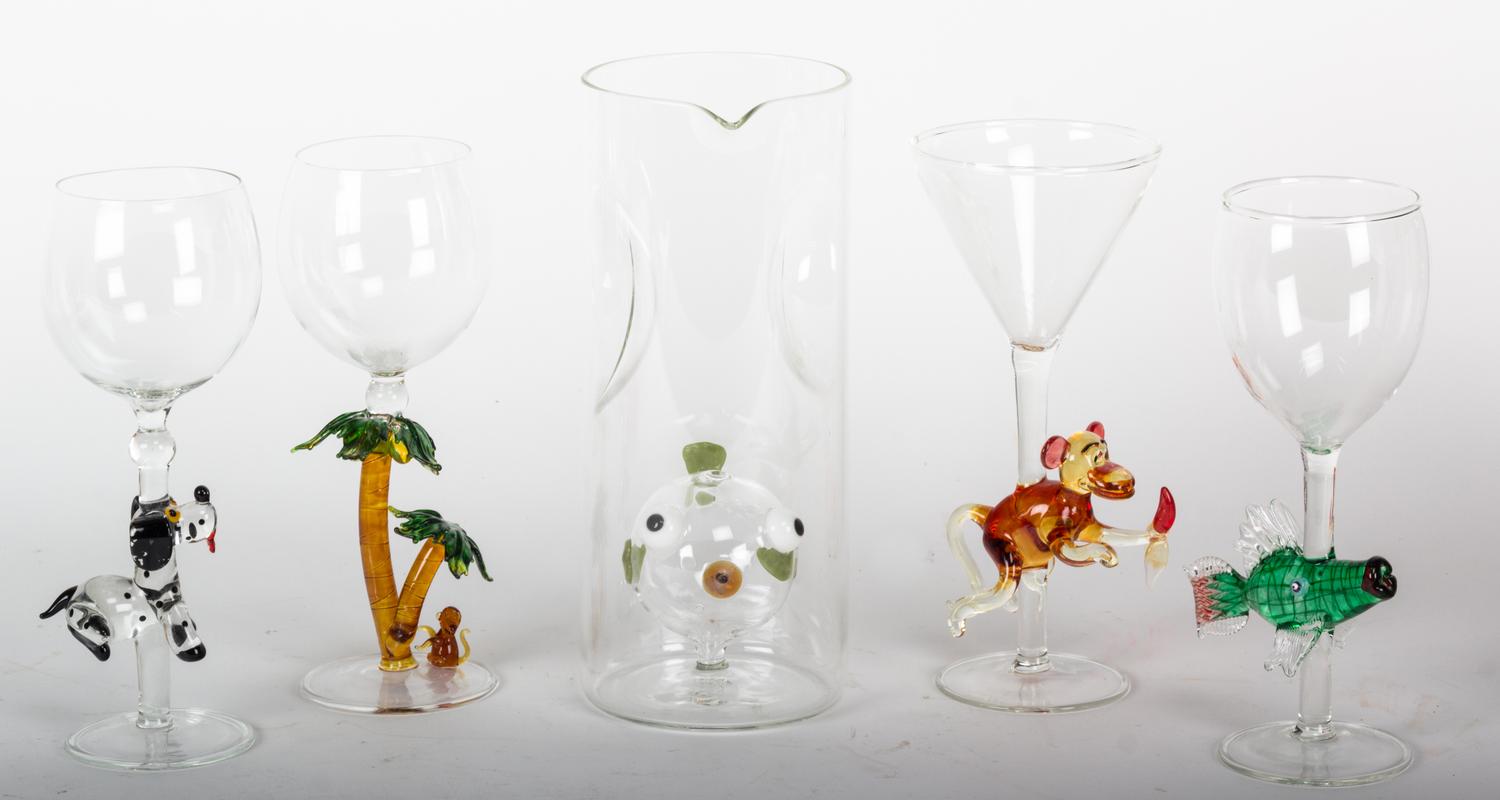 A Set of Whimsical Blown Glass Stemware Height of pitcher 10 inches.