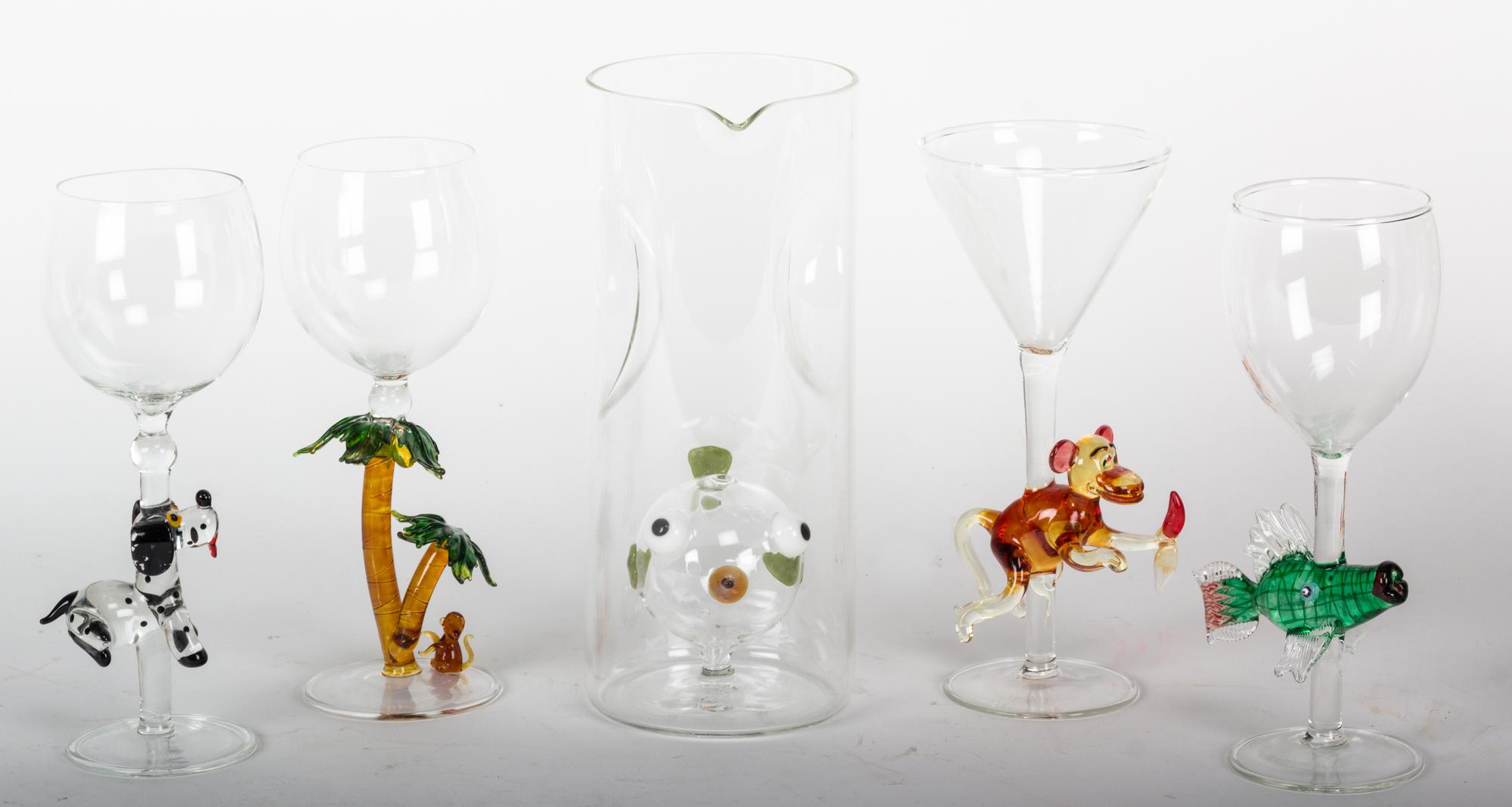 A Set of Whimsical Blown Glass Stemware Height of pitcher 10 inches.