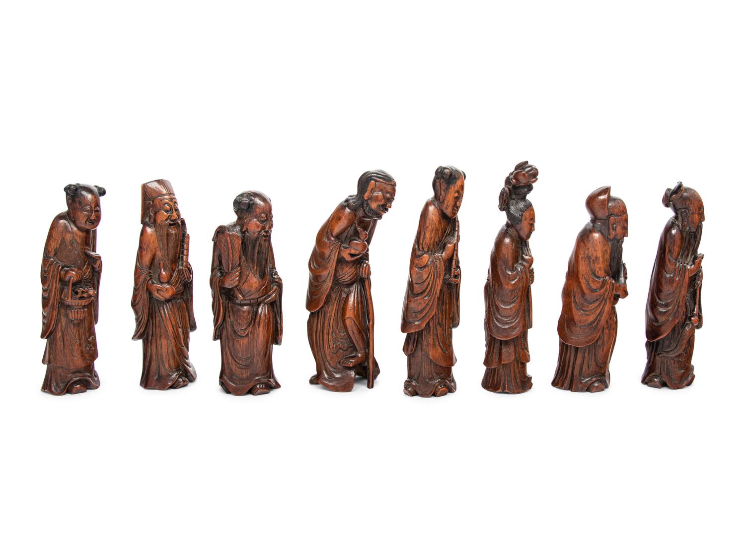 Eight Chinese Carved Hardwood Figures of the Daoist Immortals