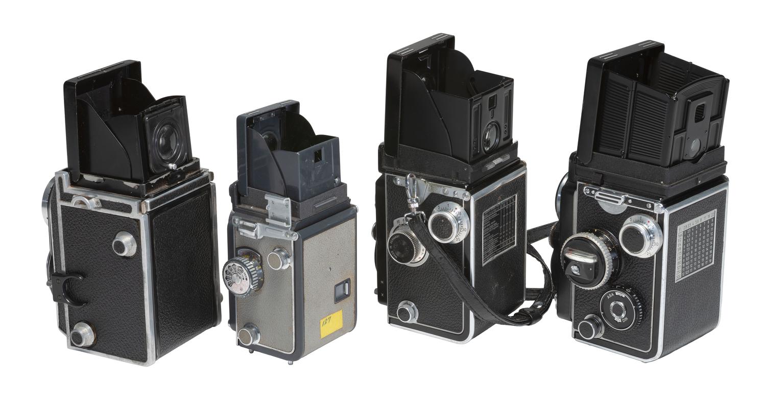 [CAMERAS]. 4 Twin Lens Reflex cameras with related material, incl. two Rolleiflex cameras.