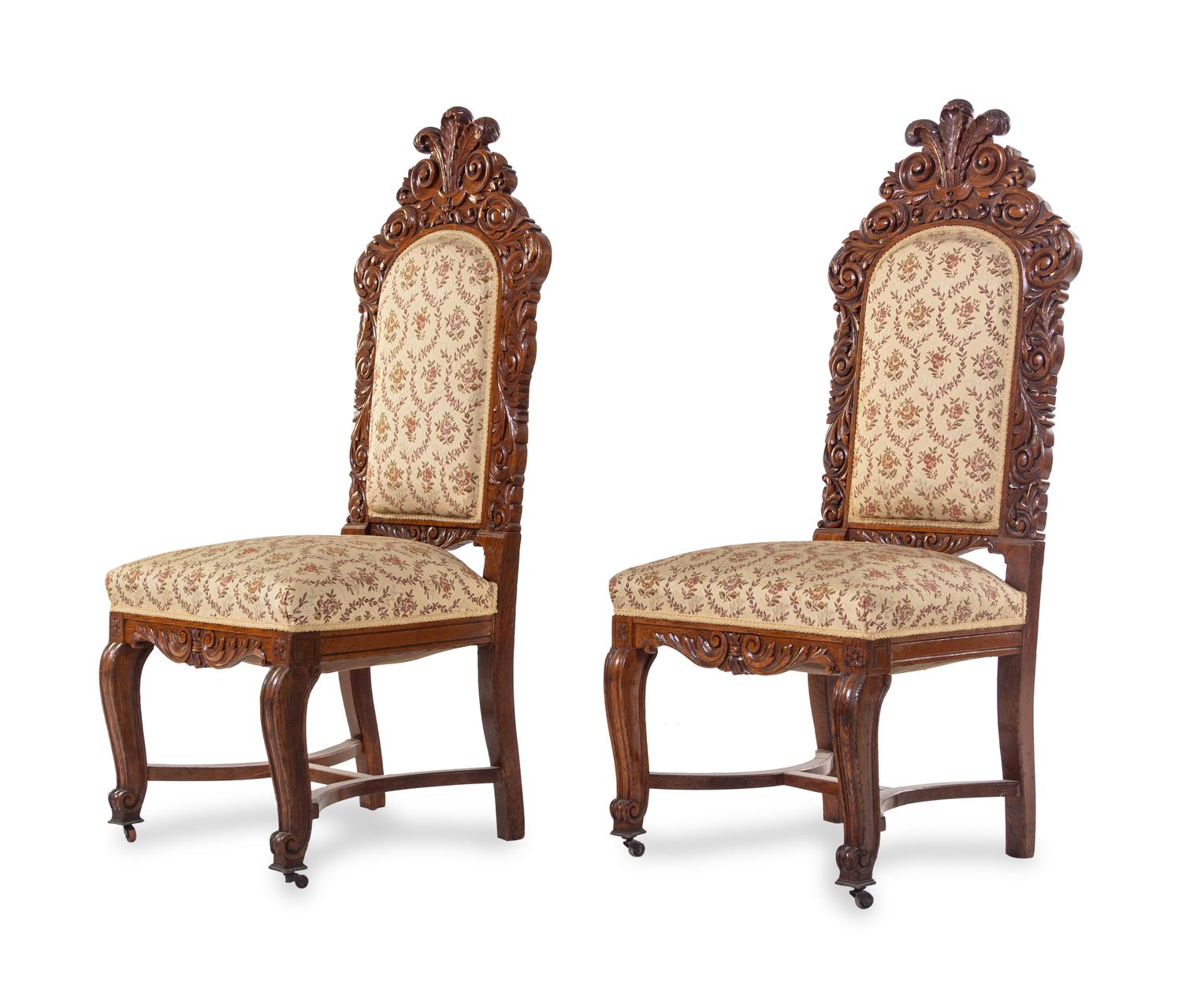 A Set of Eight Renaissance Revival Carved Oak Dining Chairs