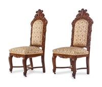 A Set of Eight Renaissance Revival Carved Oak Dining Chairs