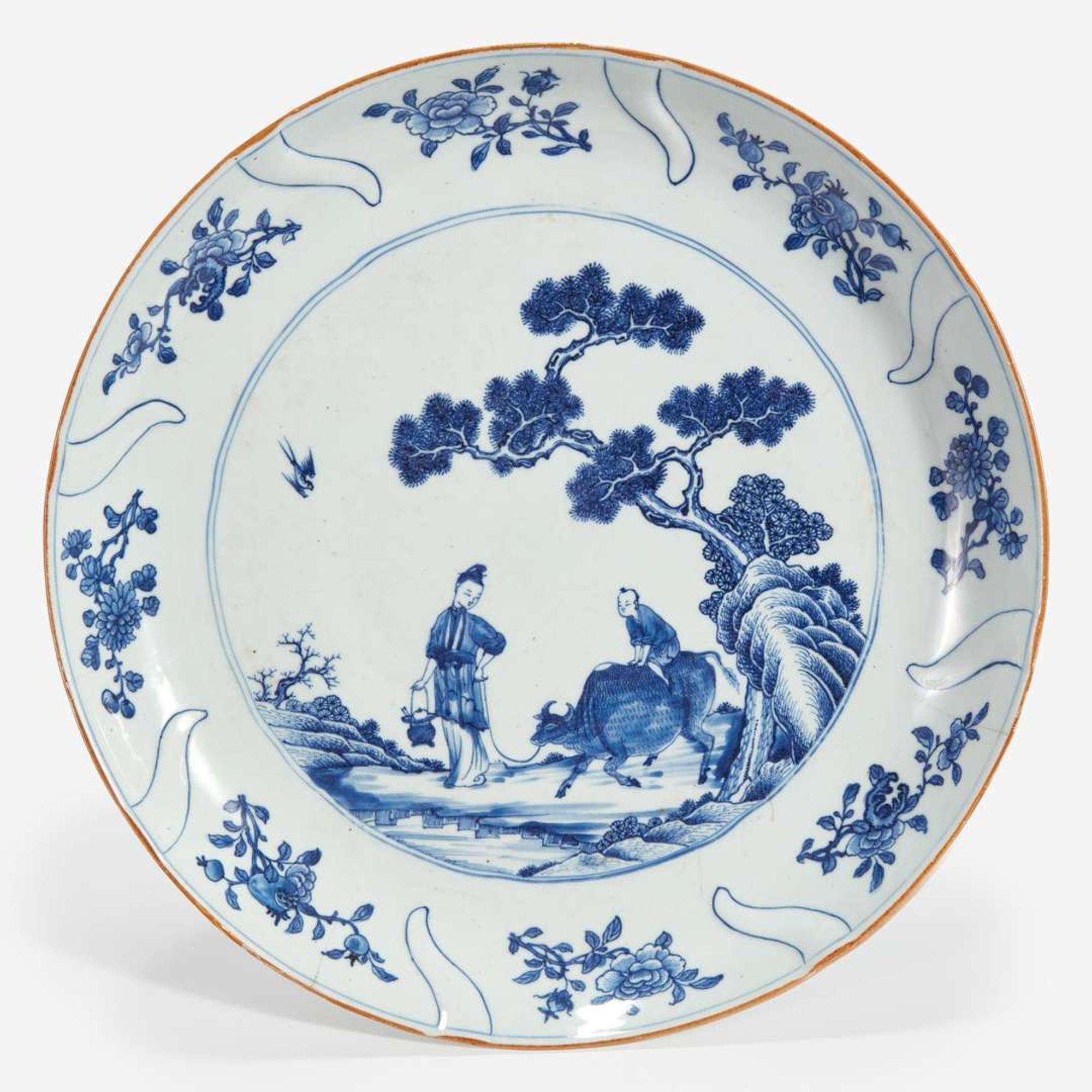 A Chinese export molded blue and white porcelain "Meiren, Boy and Buffalo" large dish 18th century