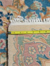 A Kirman Wool Rug