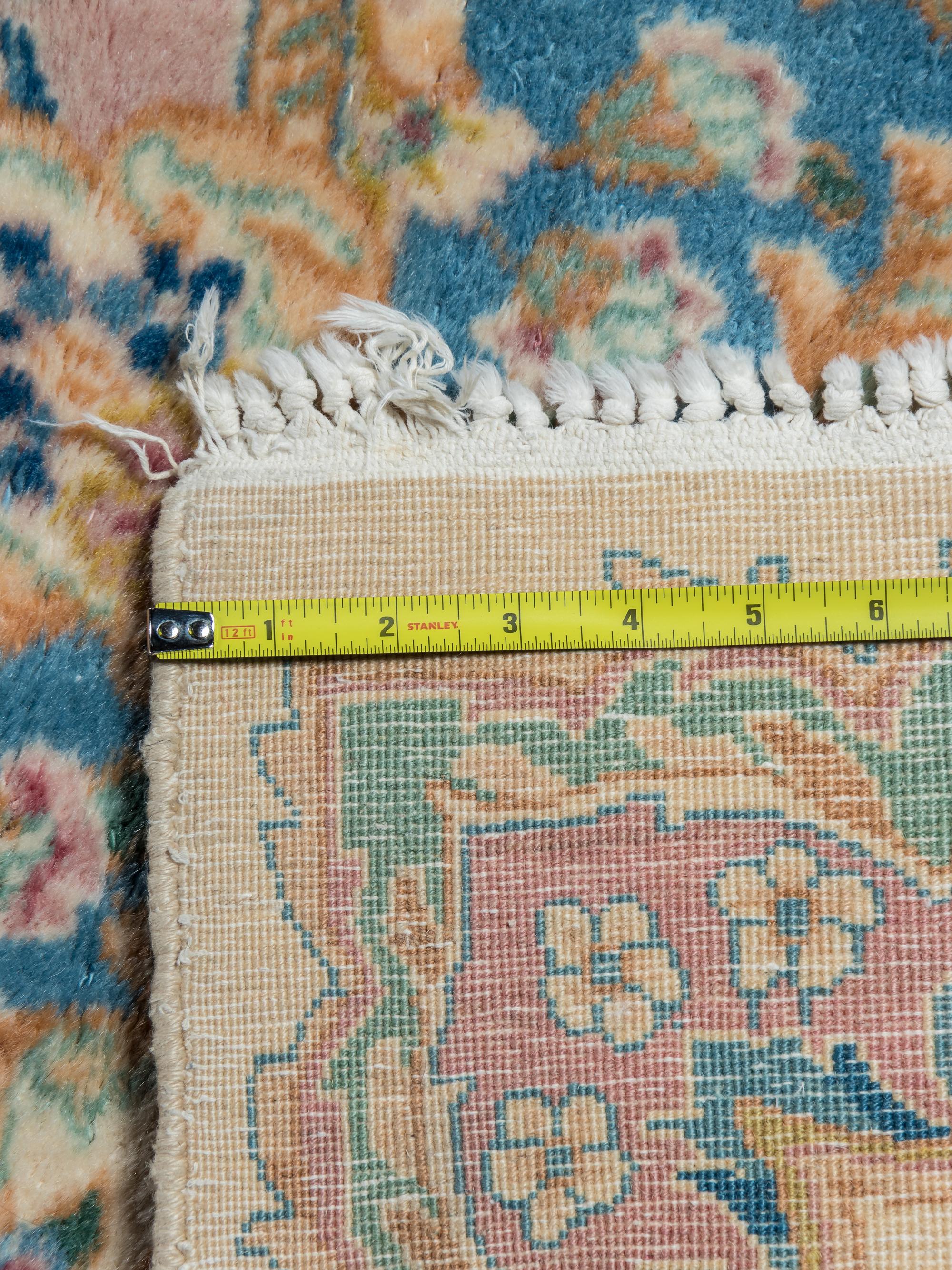 A Kirman Wool Rug