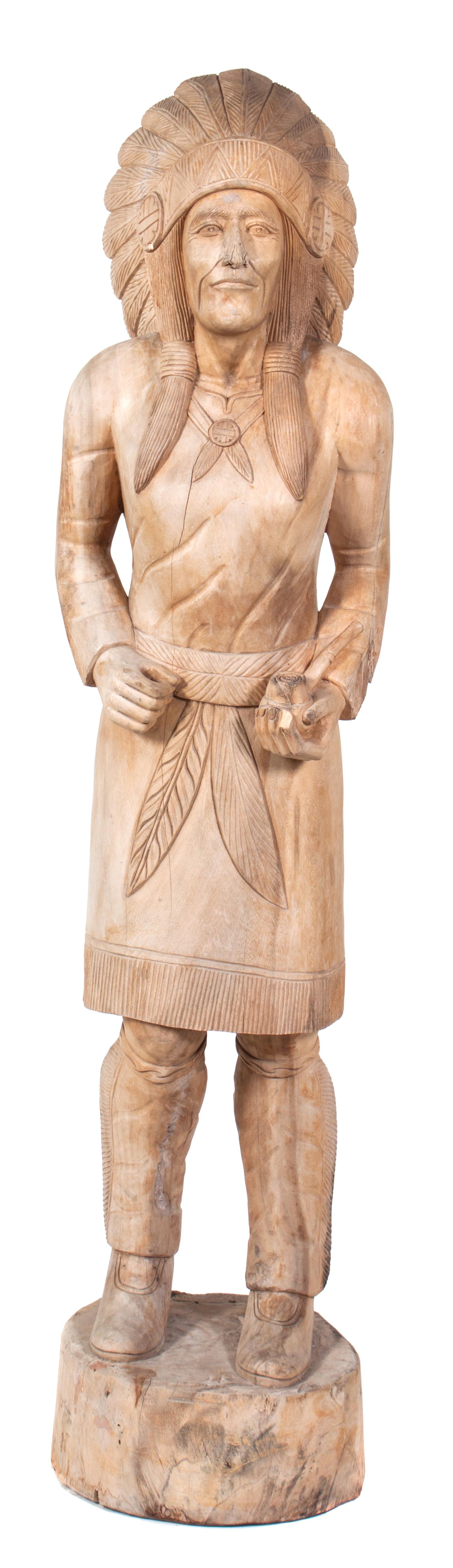 A Carved Wood Cigar Store Indian Chief Height 74 3/4 inches.