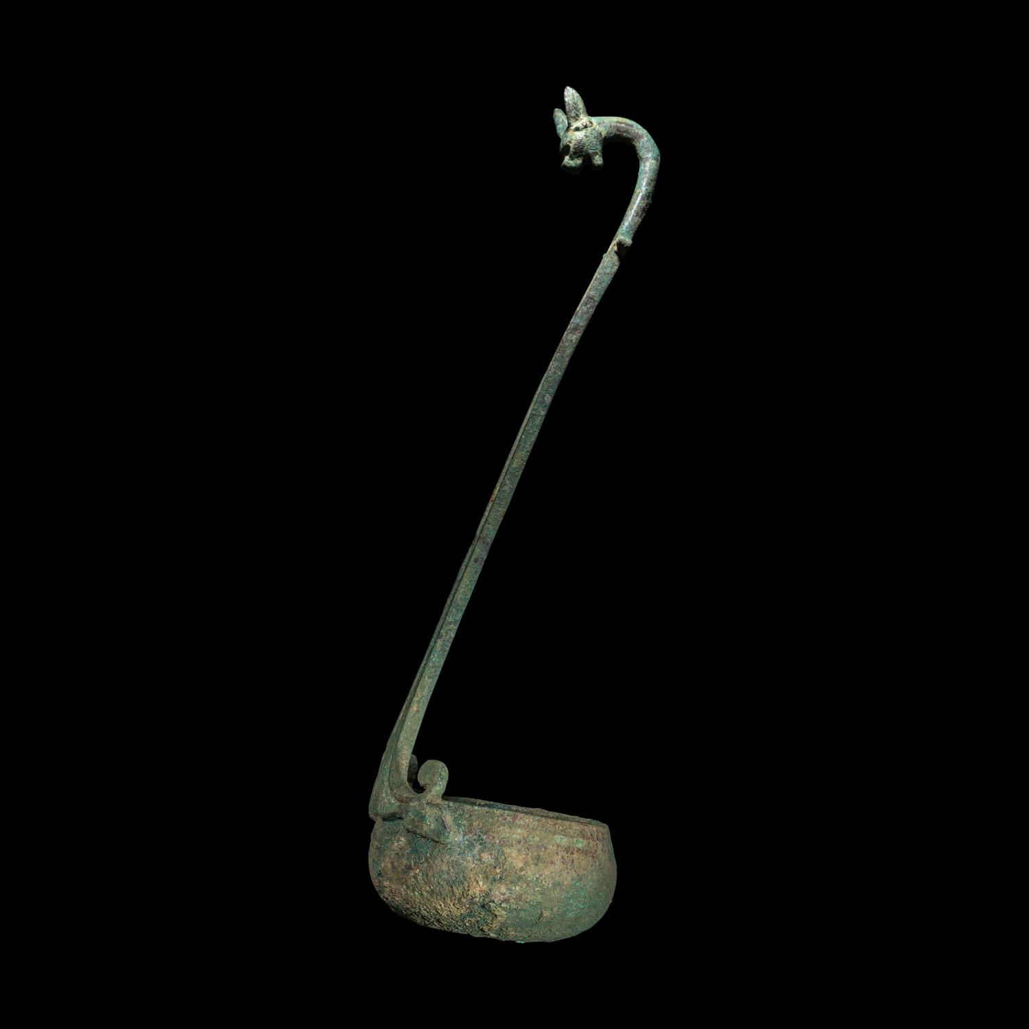 A Roman Bronze Ladle with Panther Handle