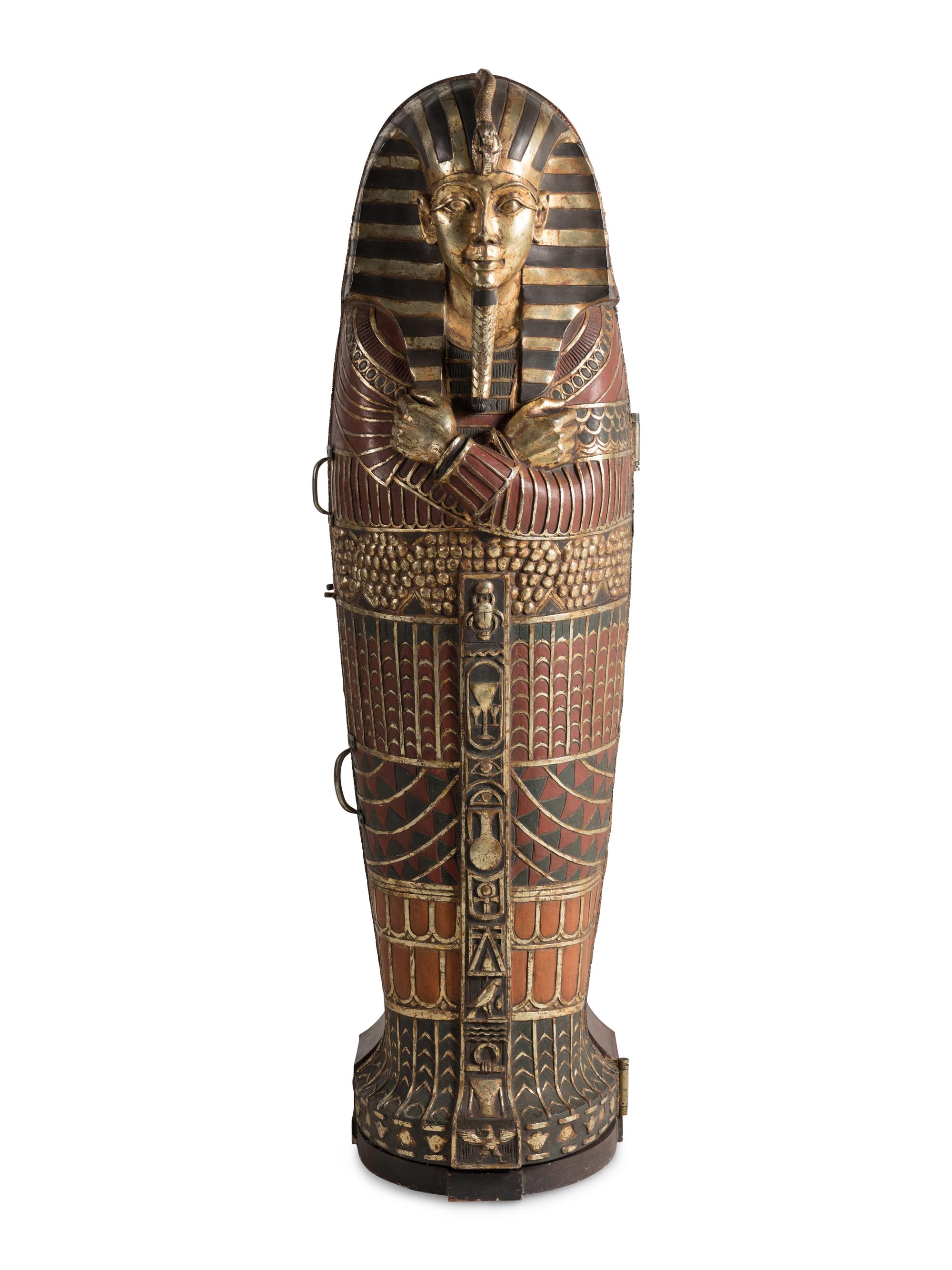 A Continental Carved and Painted Wood Sarcophagus-Form Bar Cabinet