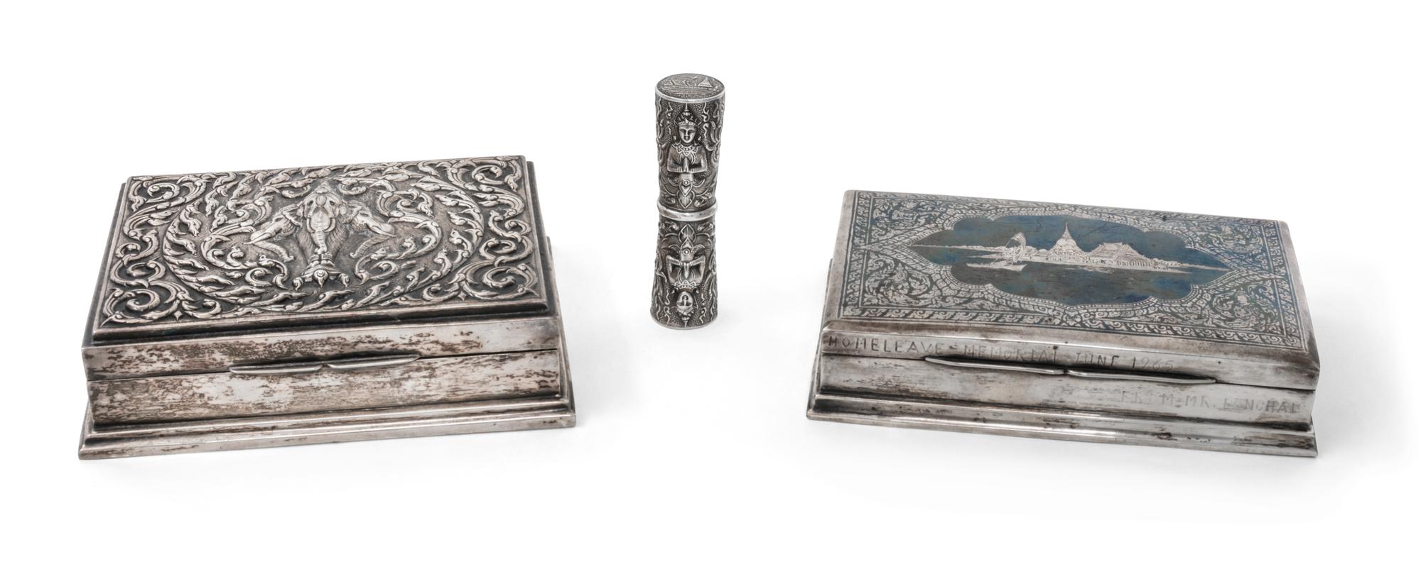 Three Thai Silver Articles, 20th Century, comprising a niello decorated cigarette box stamped Sterling Siam, an elephant cigarette box