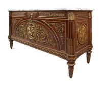 A Louis XVI Style Gilt Bronze Mounted Mahogany Marble-Top Commode à Vantaux, after the Model by Guillaume Benneman
