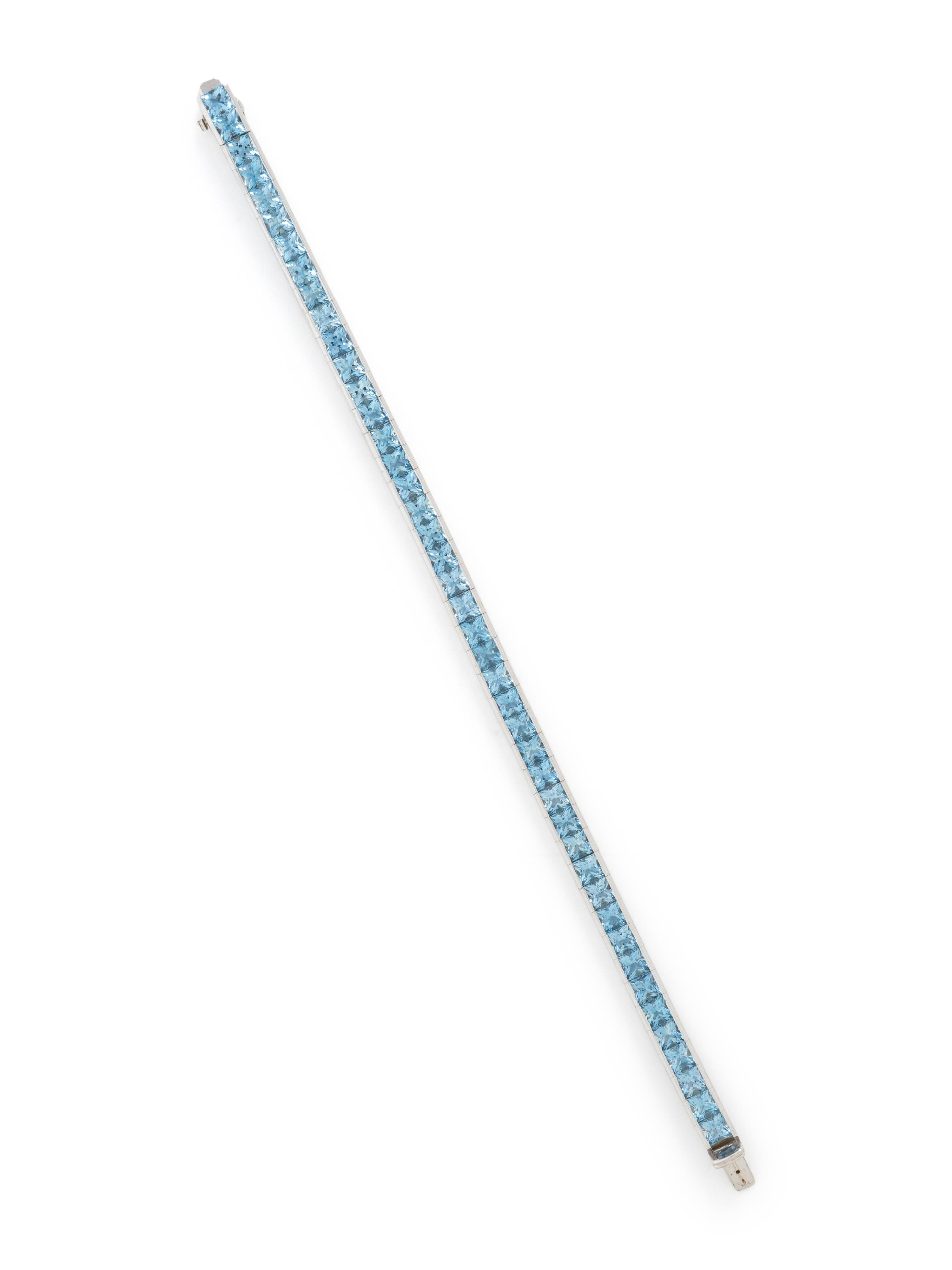 WHITE GOLD AND PRINCESS CUT AQUAMARINE LINE BRACELET